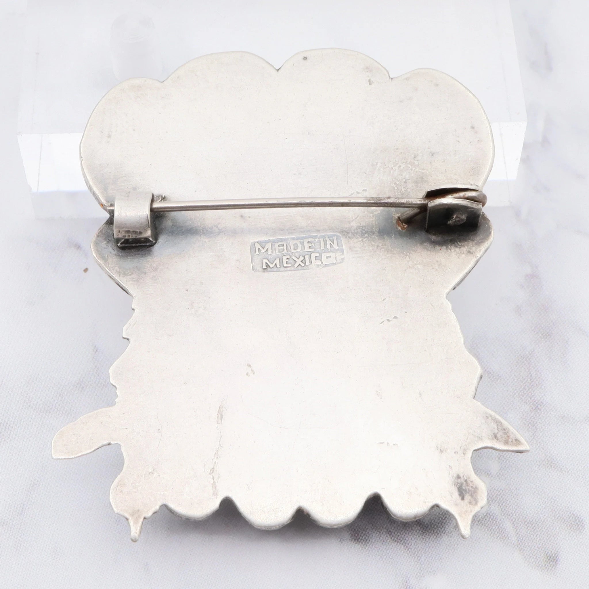 Antique Mexican sterling and carved onyx Mayan mask brooch